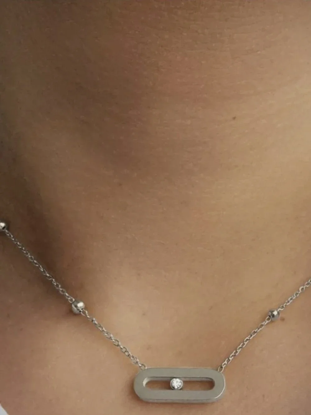 Minimalist Silver Oval Station Necklace with Crystal Accent